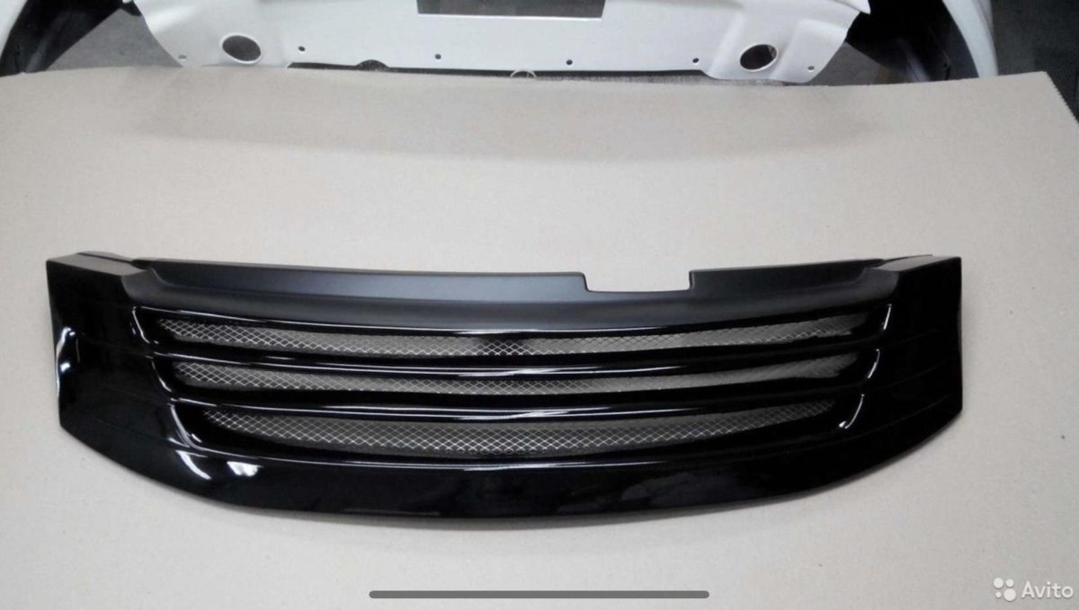 Решетка Geely Emgrand ec7