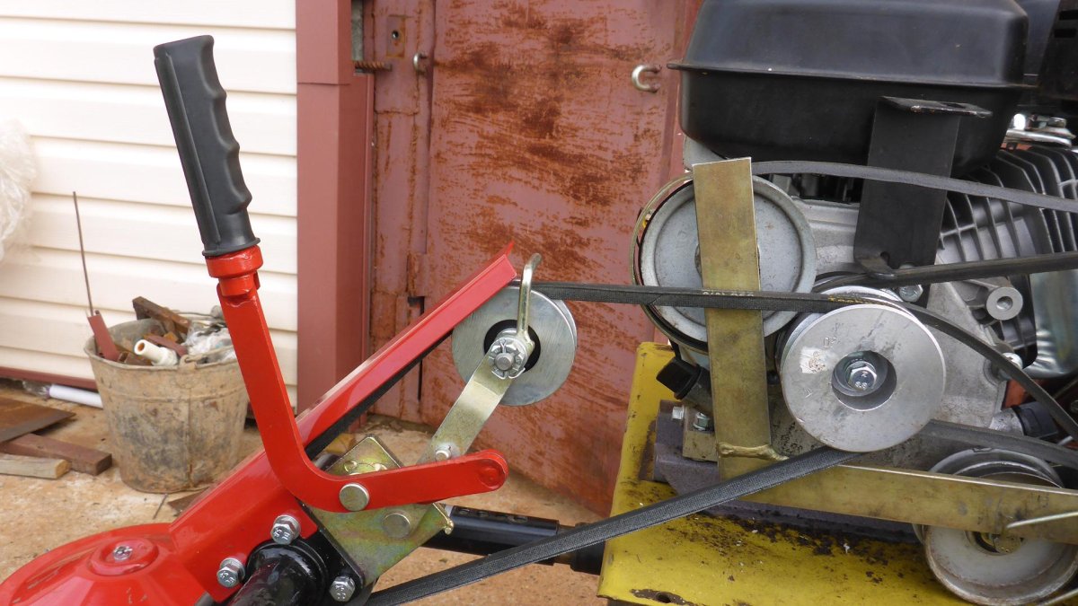 Натяжной механизм роторной косилки Заря