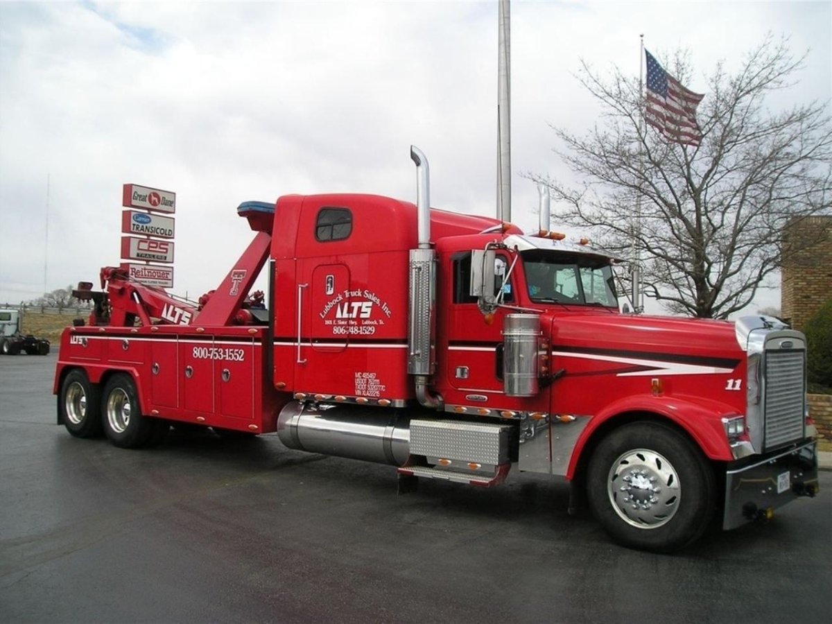 Freightliner FLD-120 эвакуатор