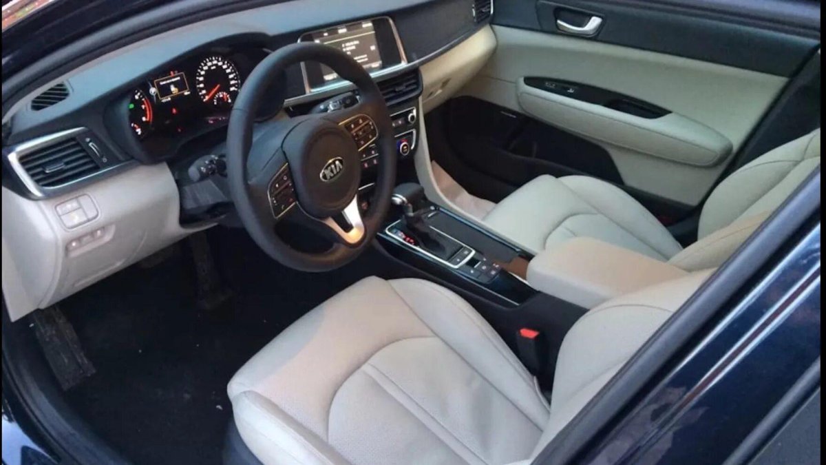 Kia Optima белый салон