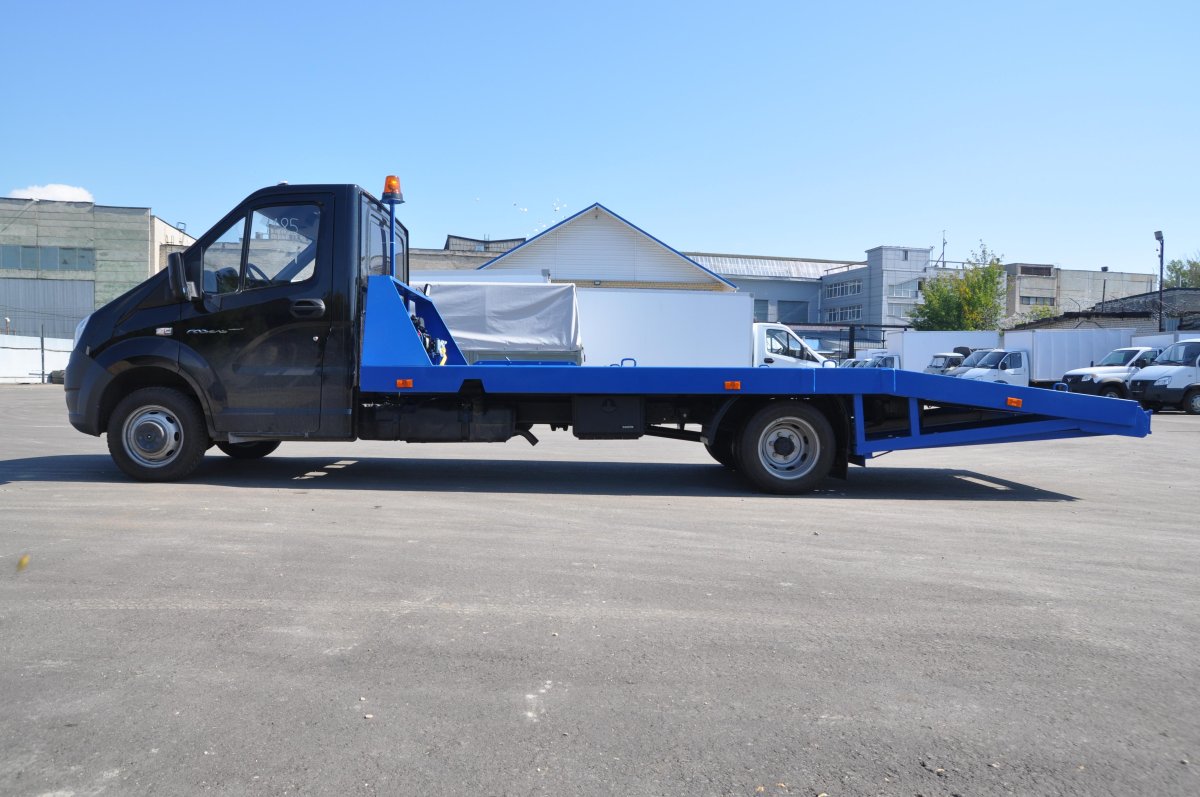 Эвакуатор Газель Некст со сдвижной платформой