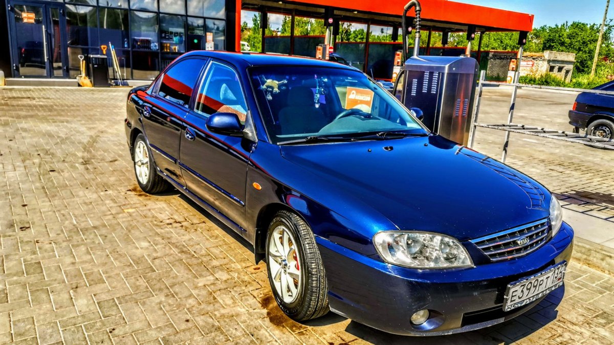 Киа спектра мерцающий синий