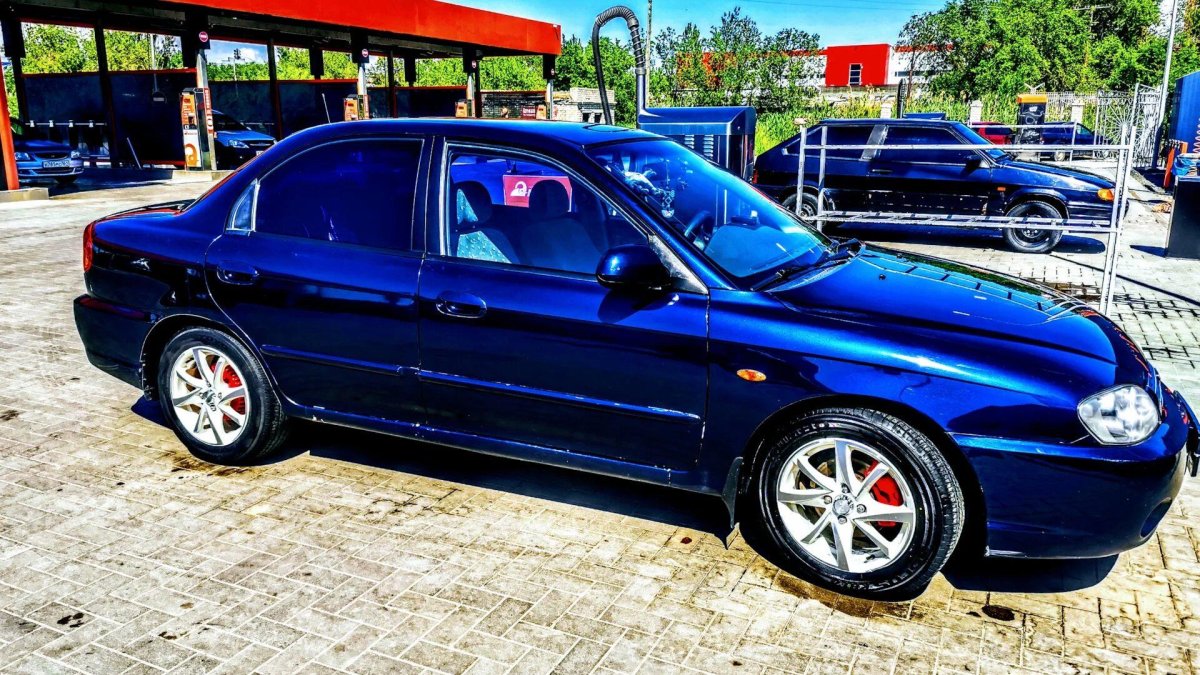 Киа спектра мерцающий синий