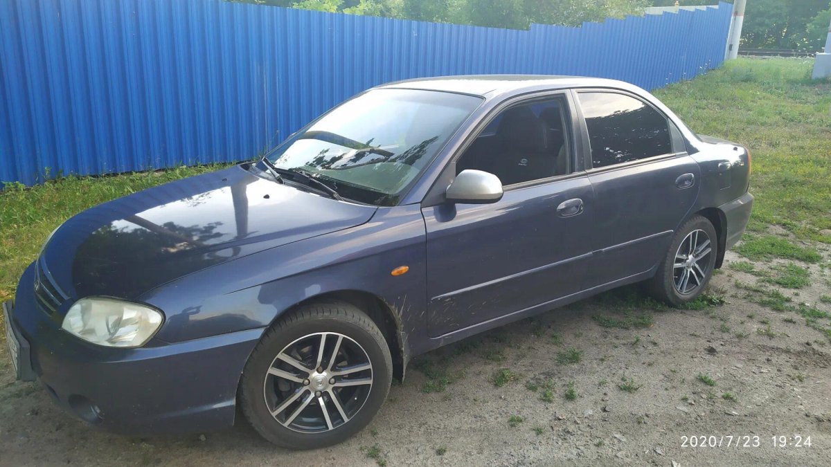 Киа спектра мерцающий синий