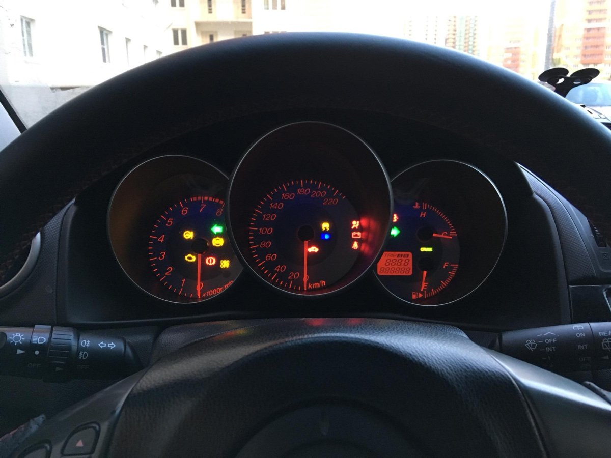 Приборная панель Мазда 3 2007