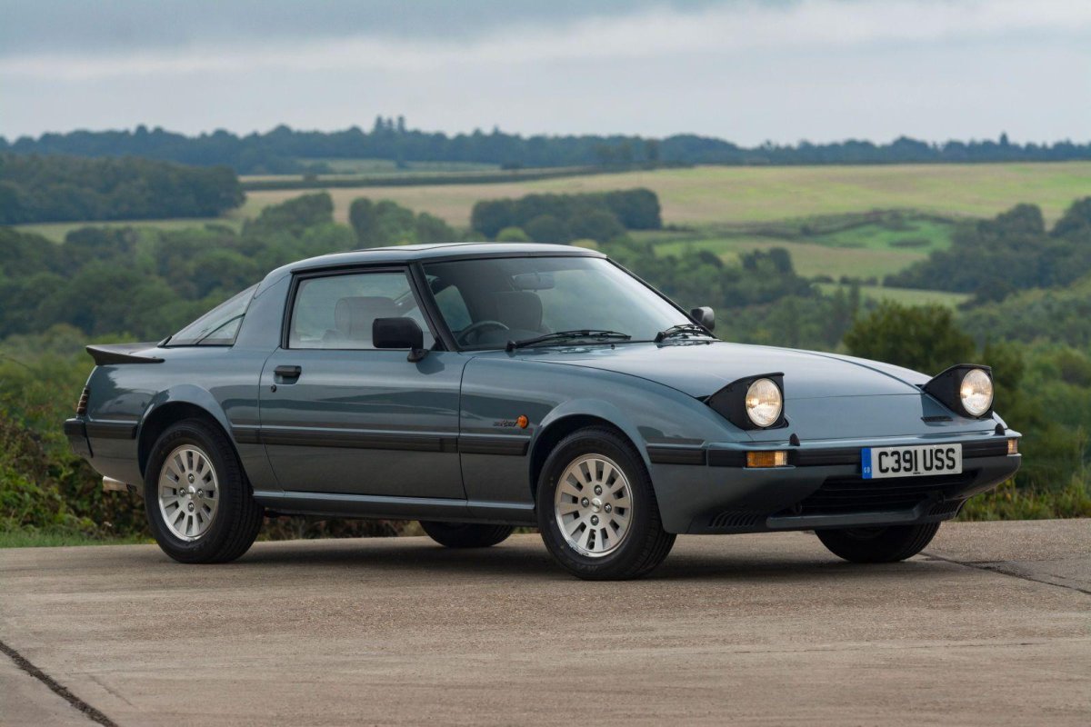 Мазда с открывающимися фарами 323