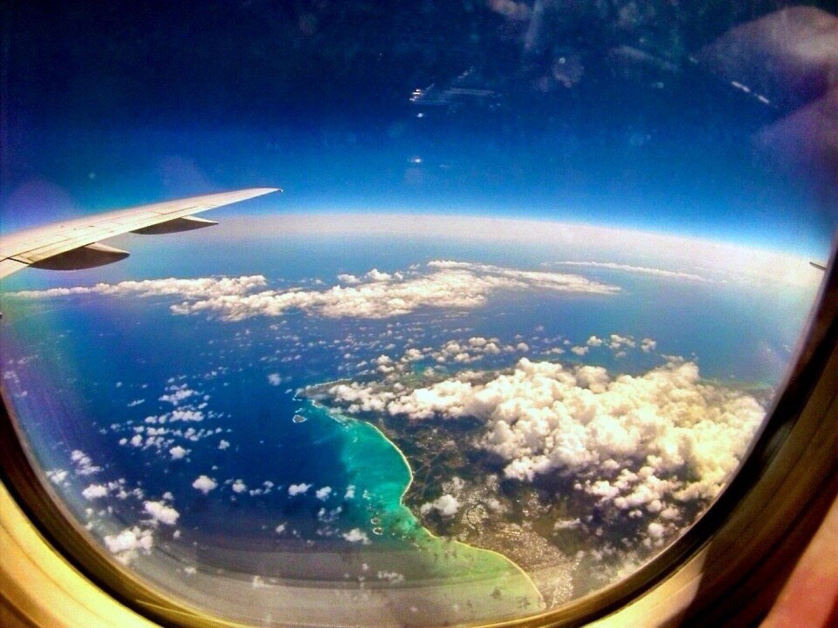 Виз из илюминатора самолета