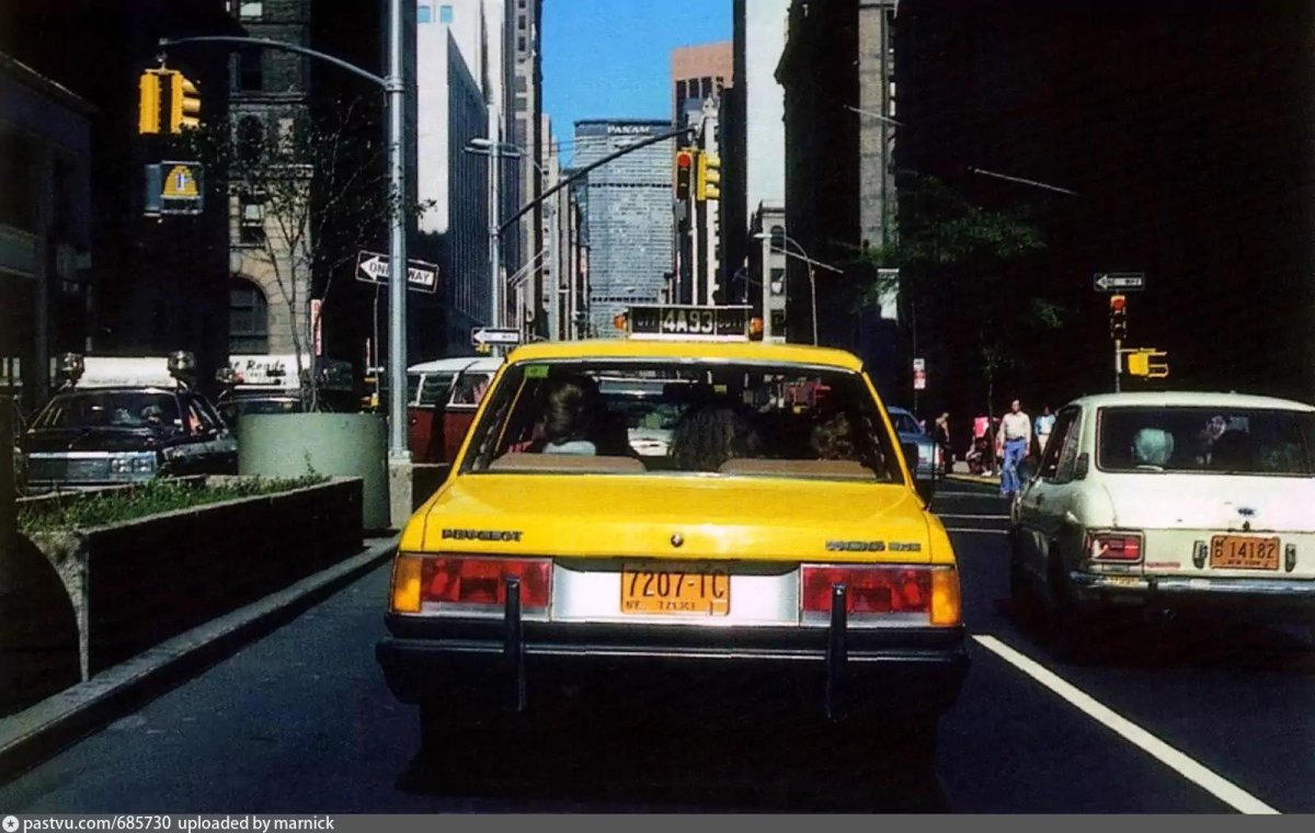 Yellow Peugeot 505 Cab in NYC