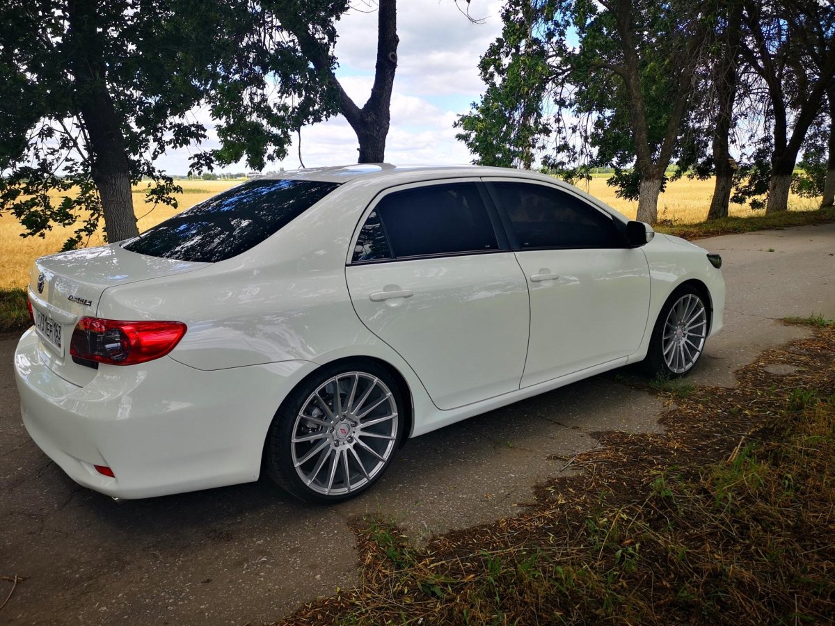 Тойота Королла 210