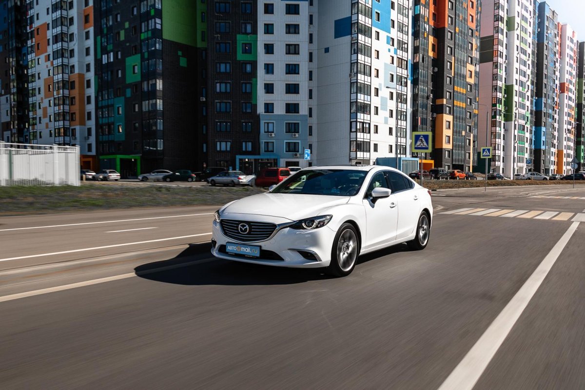 Мазда Оптима