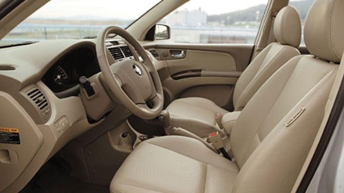 Киа Спортейдж 2 бежевый салон