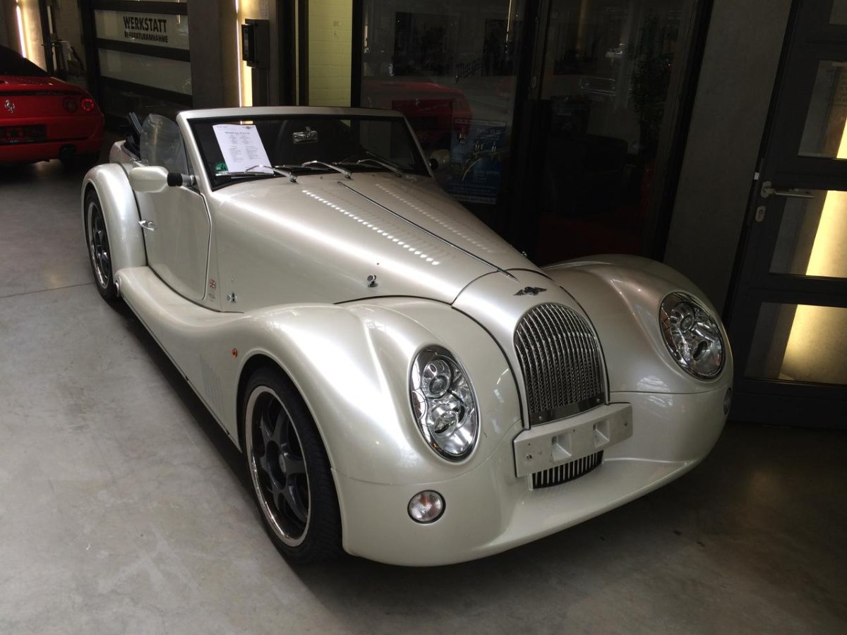 Порше Роллс Ройс