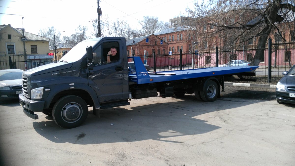 Газон Некст эвакуатор со сдвижной платформой