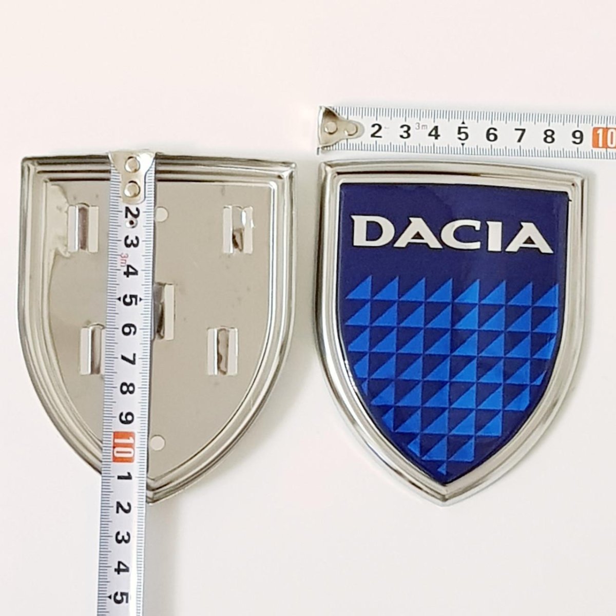 Эмблема передняя Dacia Logan