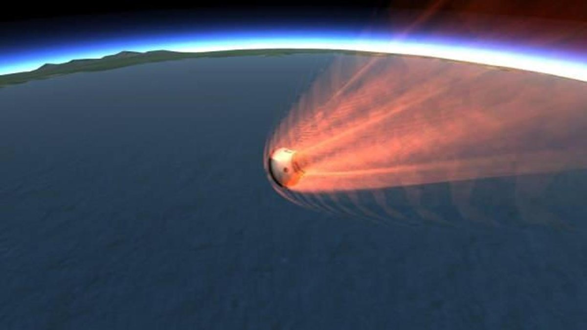 Космический корабль входит в атмосферу земли