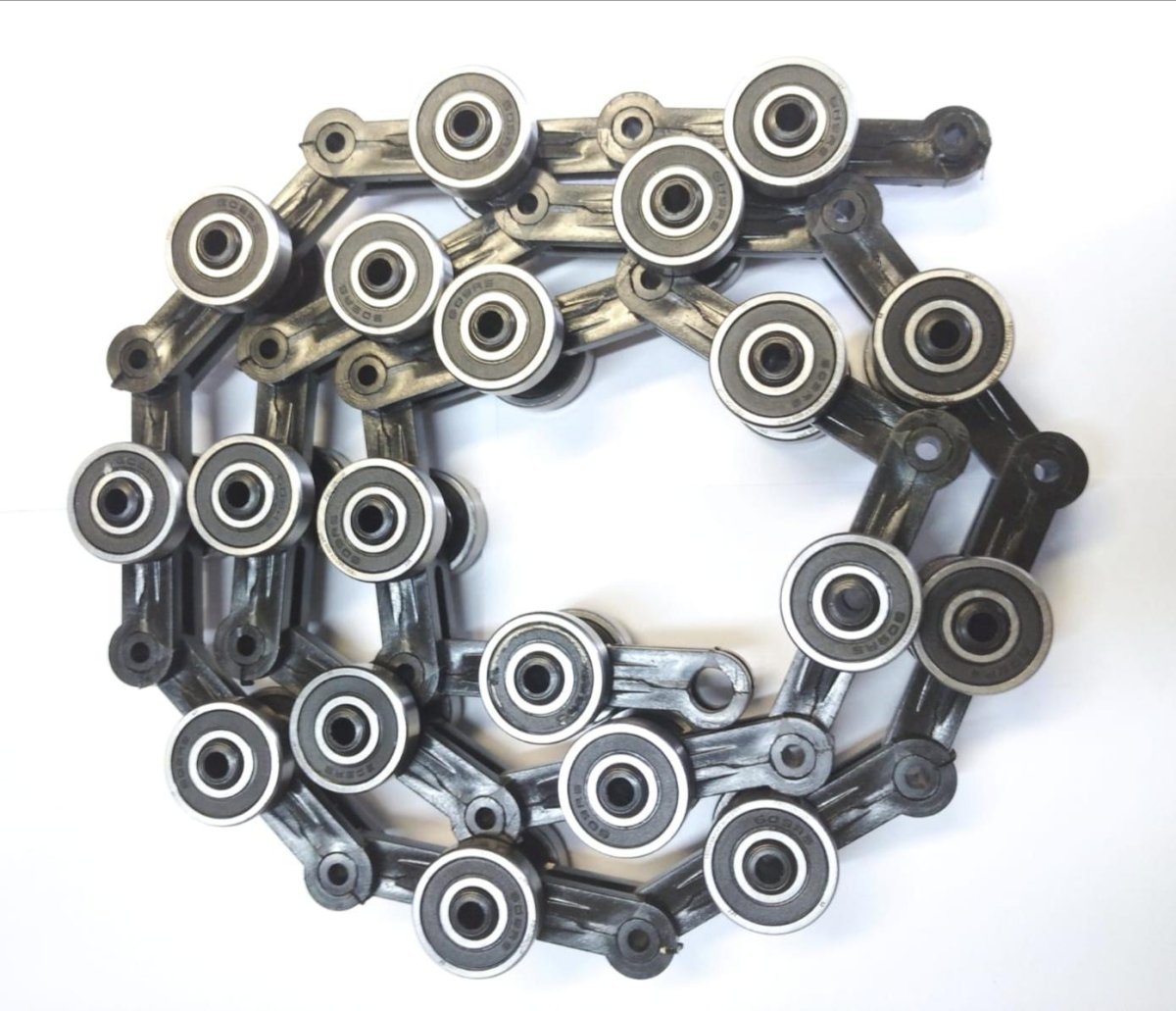 Цепь роликовая (батарея) огибающая балюстрады поручня 17 звеньев SJEC