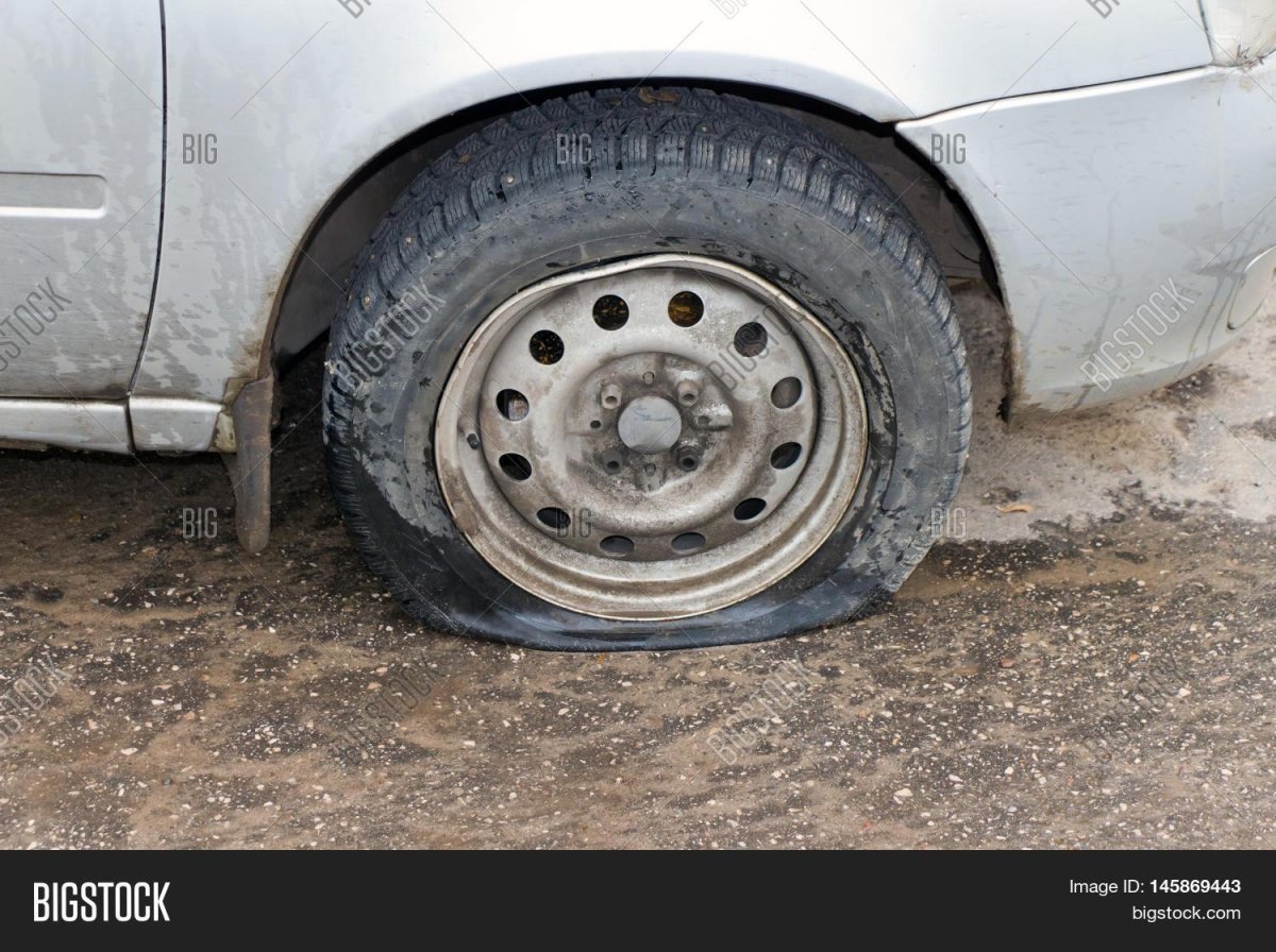 Сдутое колесо фото