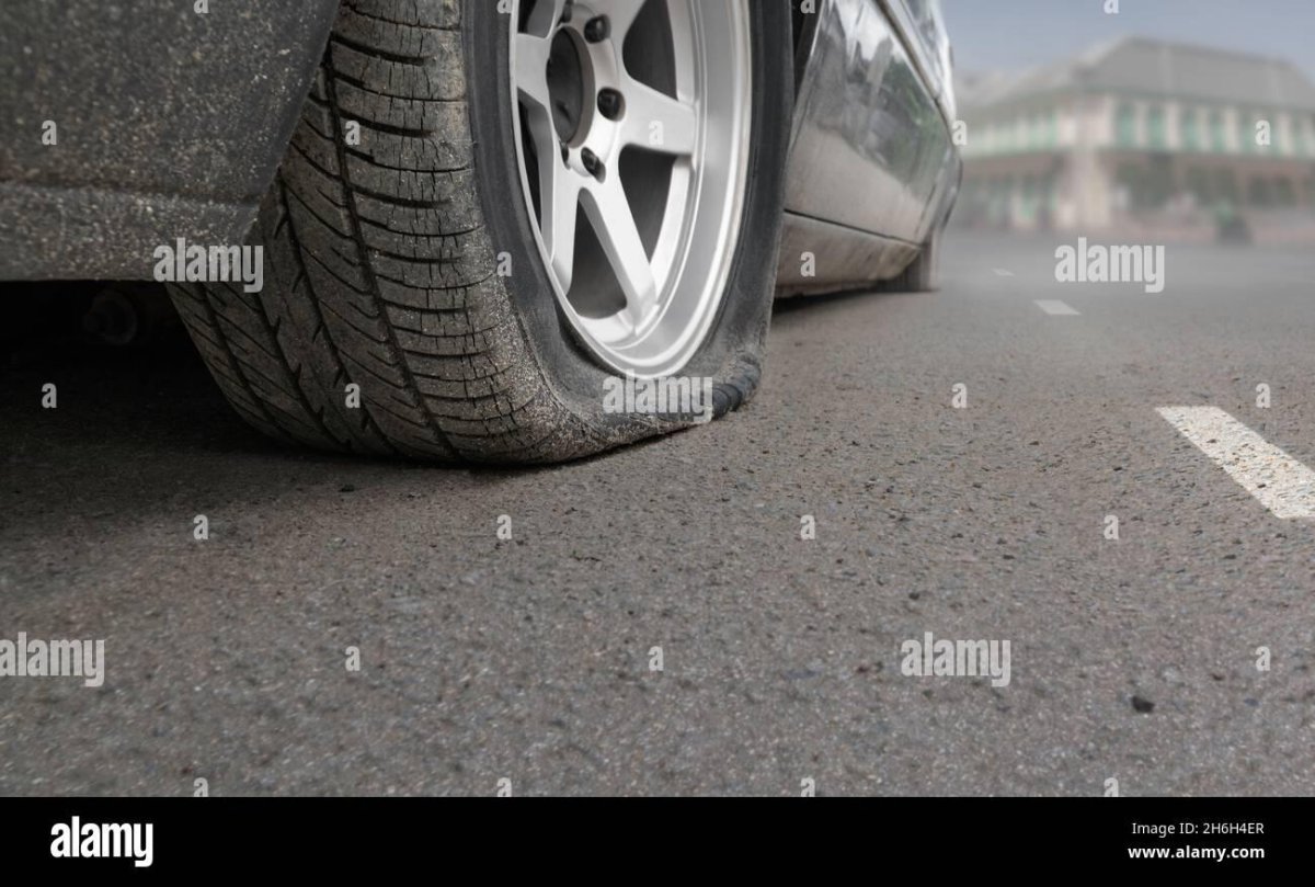 Спущенное колесо рав 4