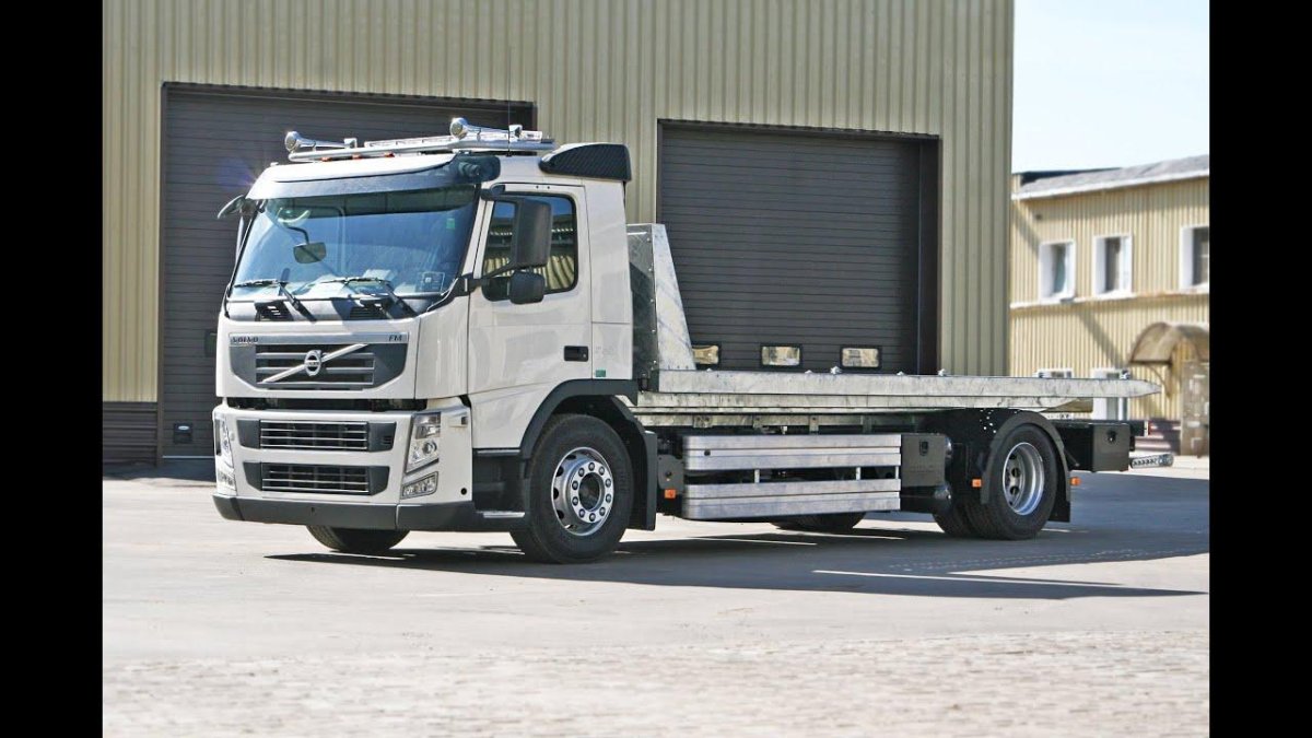 Эвакуатор Вольво с платформой