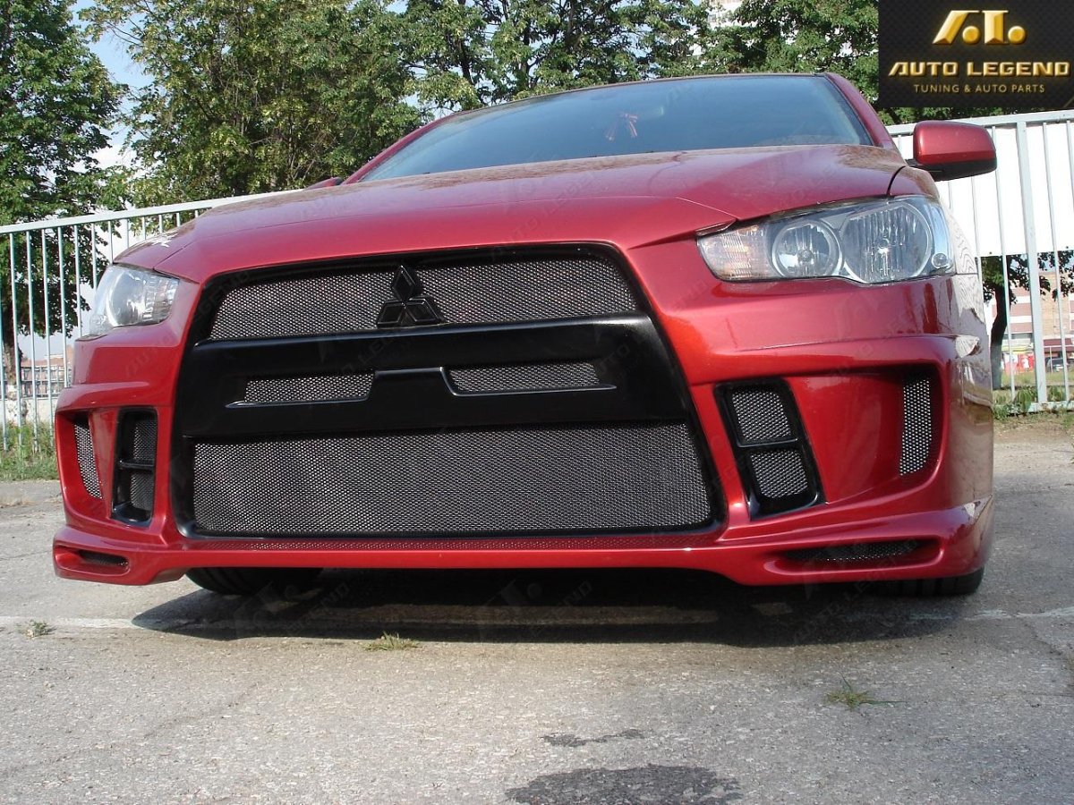 Передний бампер Митсубиси Лансер 10