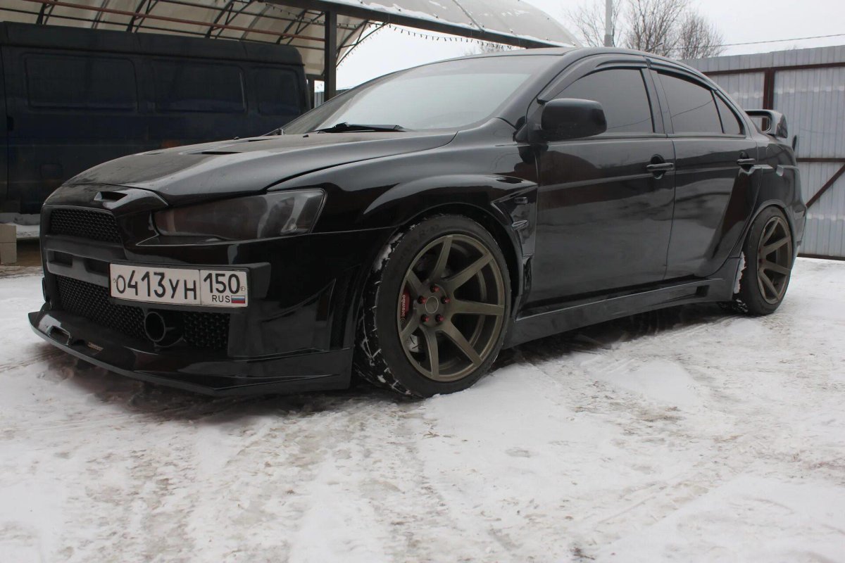 Митсубиси Лансер 10 черный