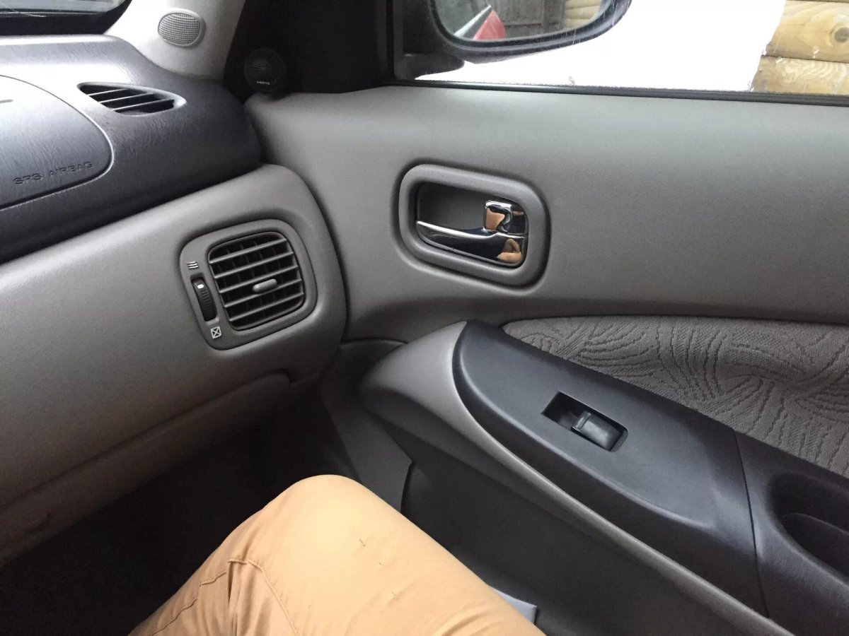 Перетяжка торпеды Ниссан Альмера Классик