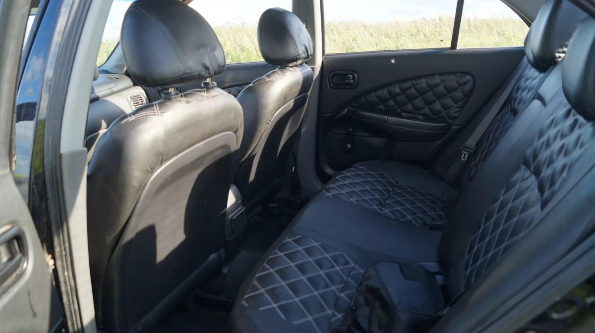 Ниссан Альмера Классик салон сзади