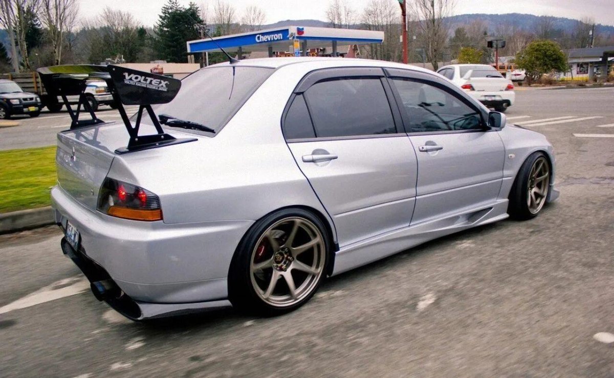 Лансер Эво 2002