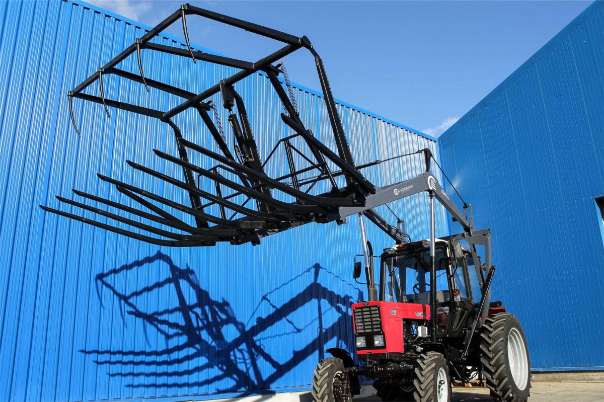 Сну-550-0 стогометатель-погрузчик