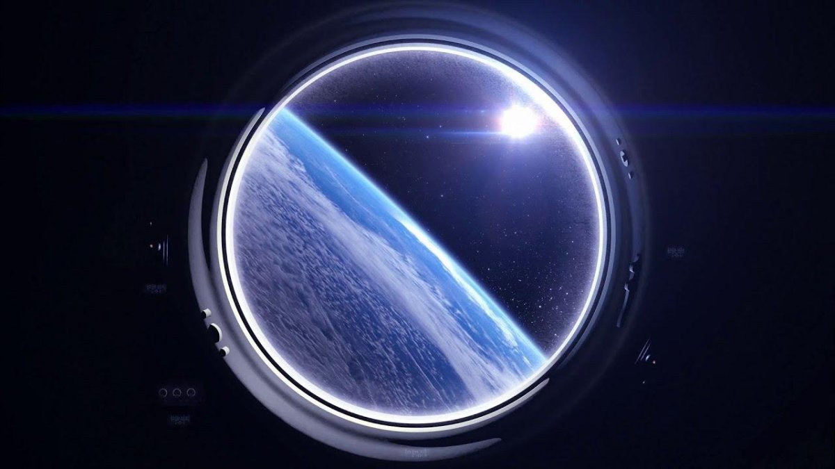 Вид из иллюминатора в космосе