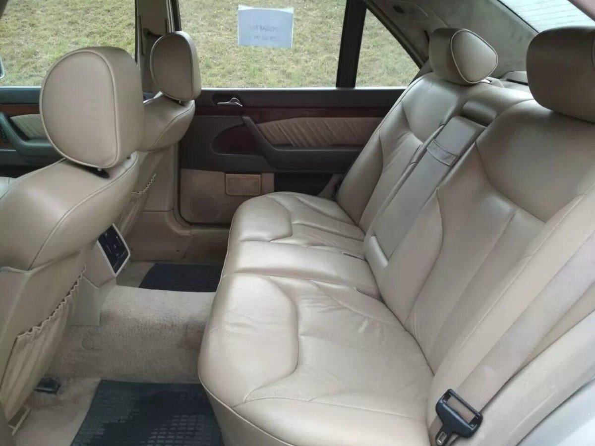 140 Мерседес с белым салоном