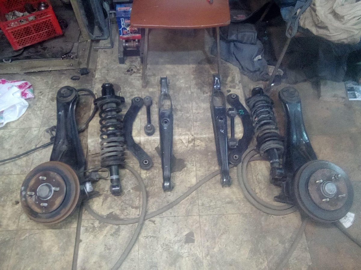 Задняя подвеска Митсубиси Каризма 2000