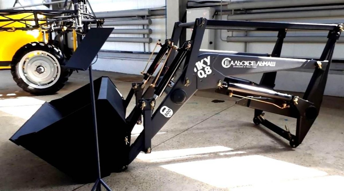 Погрузчик фронтальный ПКУ-0.8 Сальсксельмаш