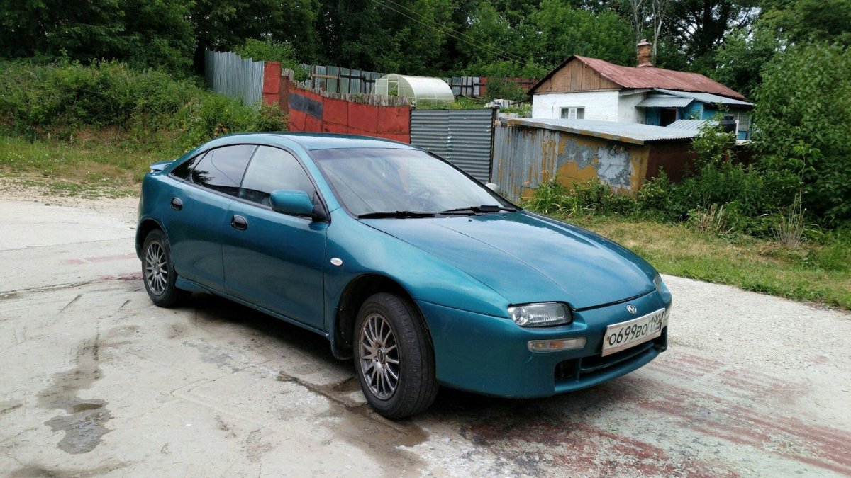 На Mazda 323 95