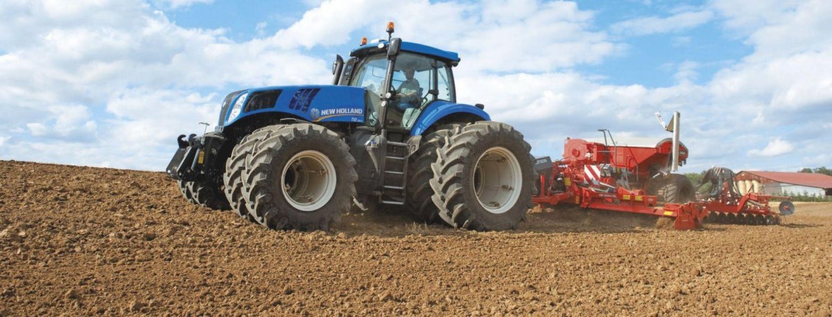 Трактор Нью Холланд