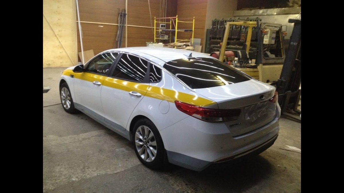 Киа Оптима желтая