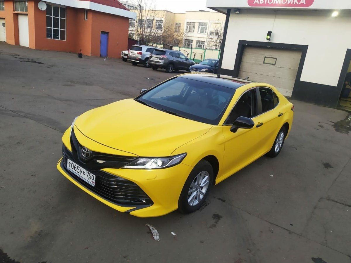 Оклейка авто в желтый цвет под такси