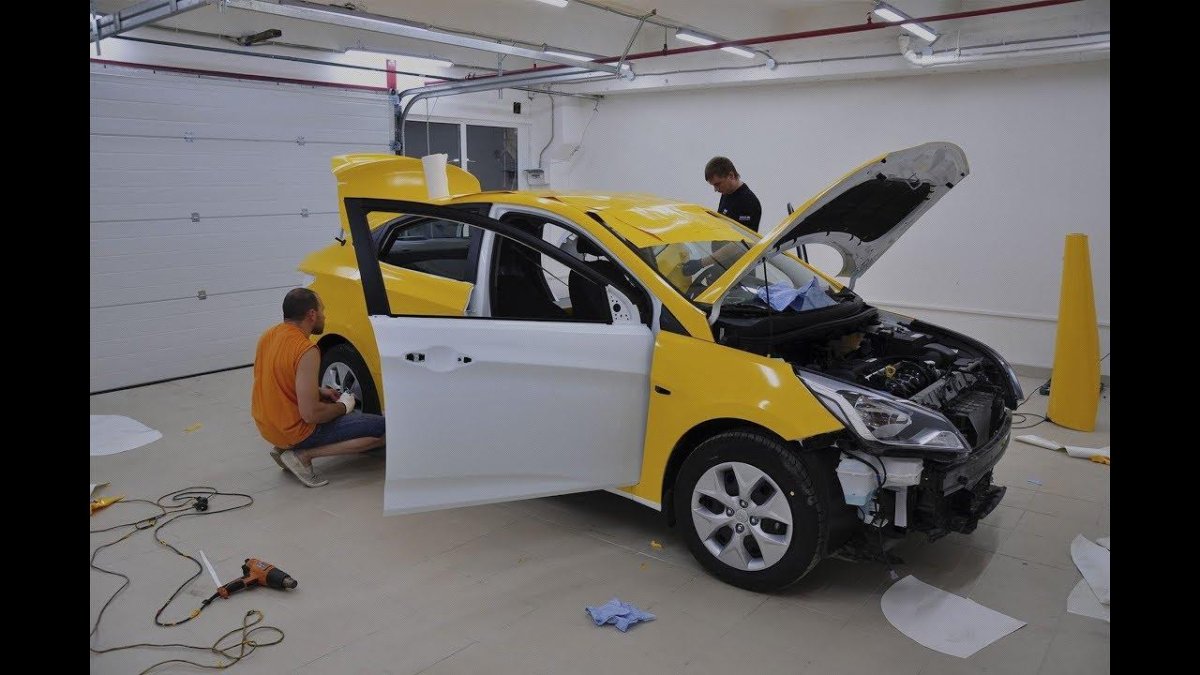 Оклейка машин такси