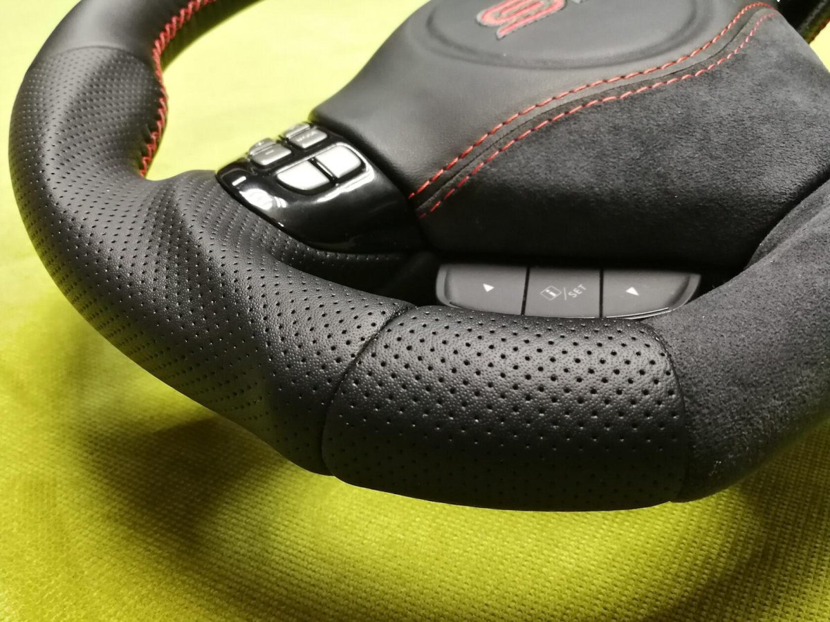 Обтяжка руля натуральной кожей