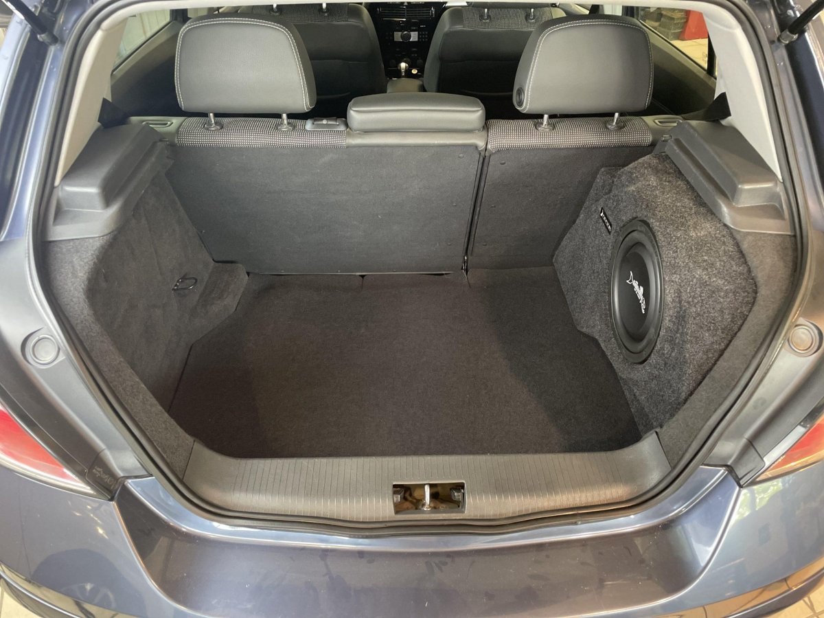 Сабвуфер под сиденье Опель Астра h