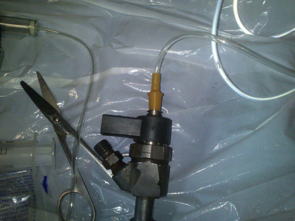 Капельница для слива солярки