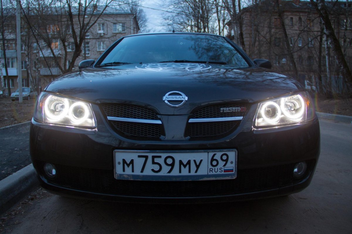 Nissan Almera n16 ангельские глазки