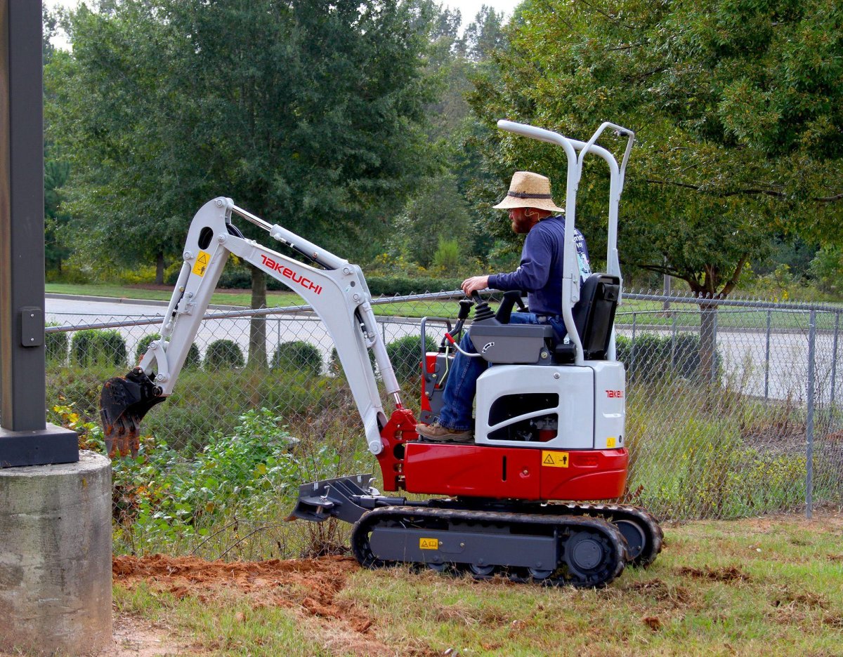 Takeuchi экскаватор