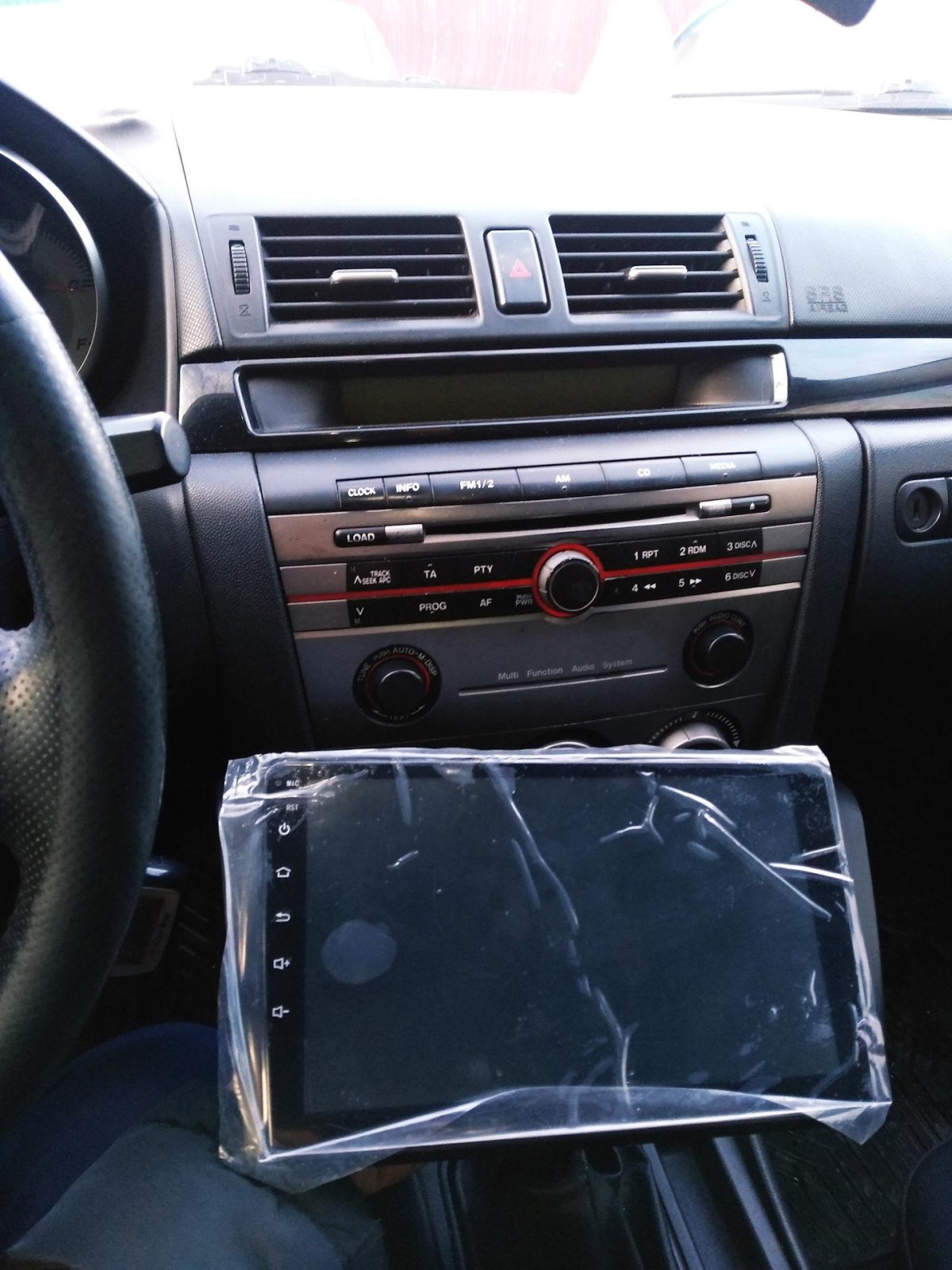 Штатная магнитола Мазда 3 БК 2006