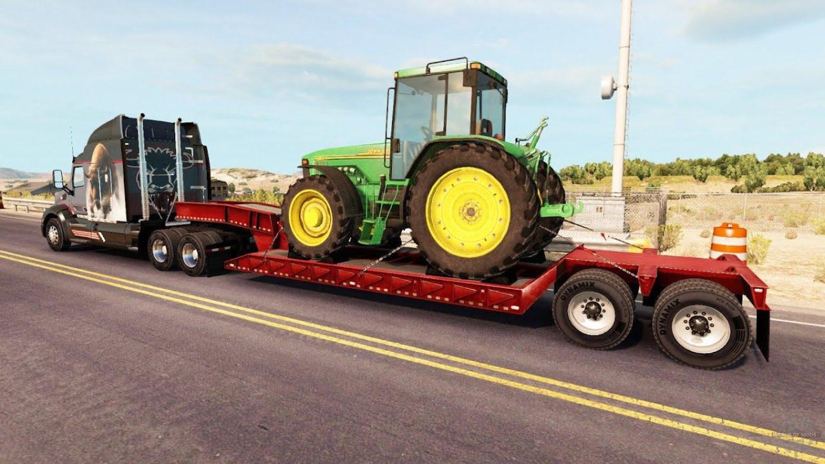 Трактор John Deere на трале