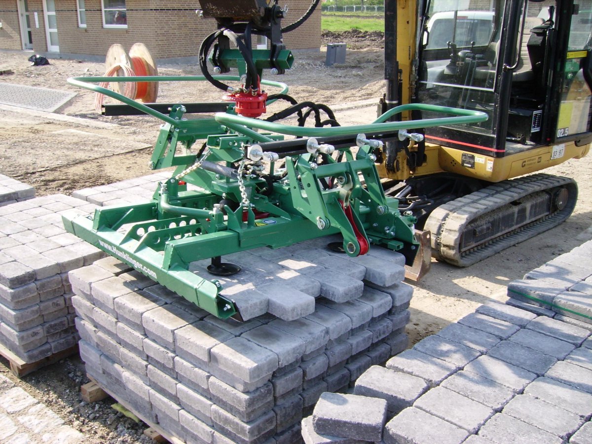 Укладчик тротуарной плитки машина