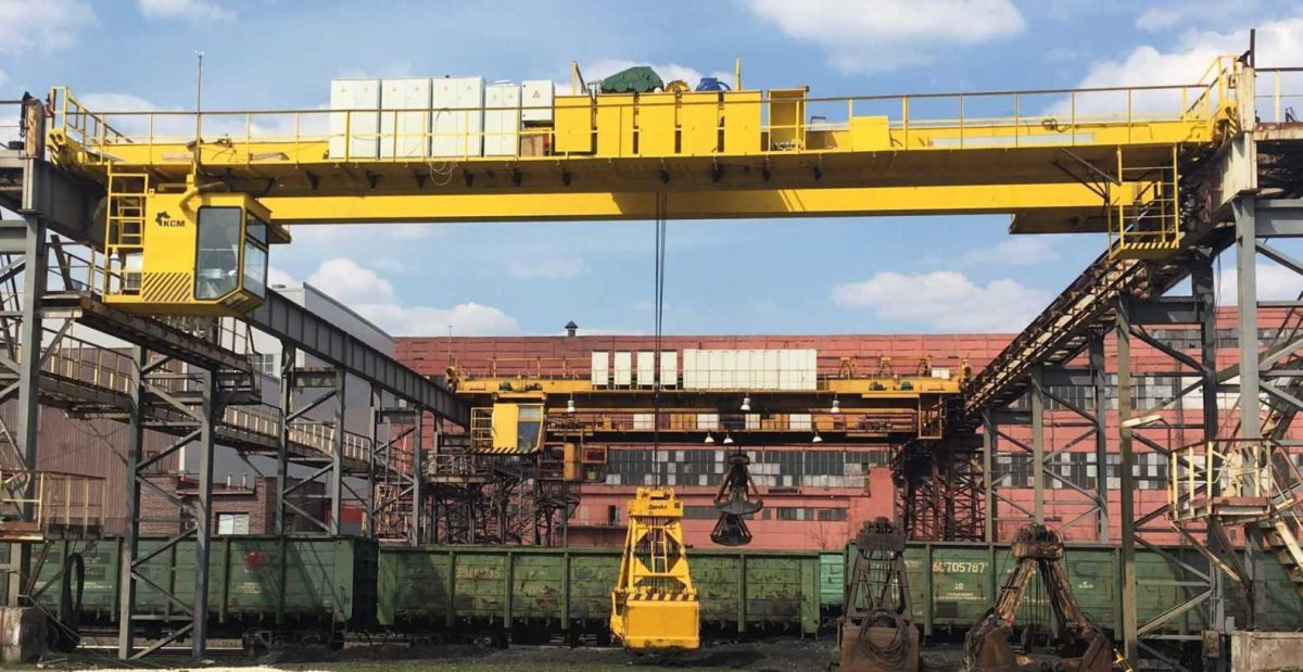 Кран мостовой двухбалочный грейферный