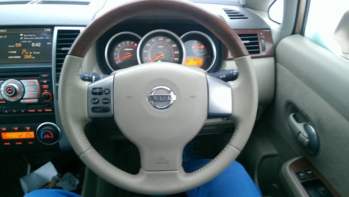 Руль Тиида с11