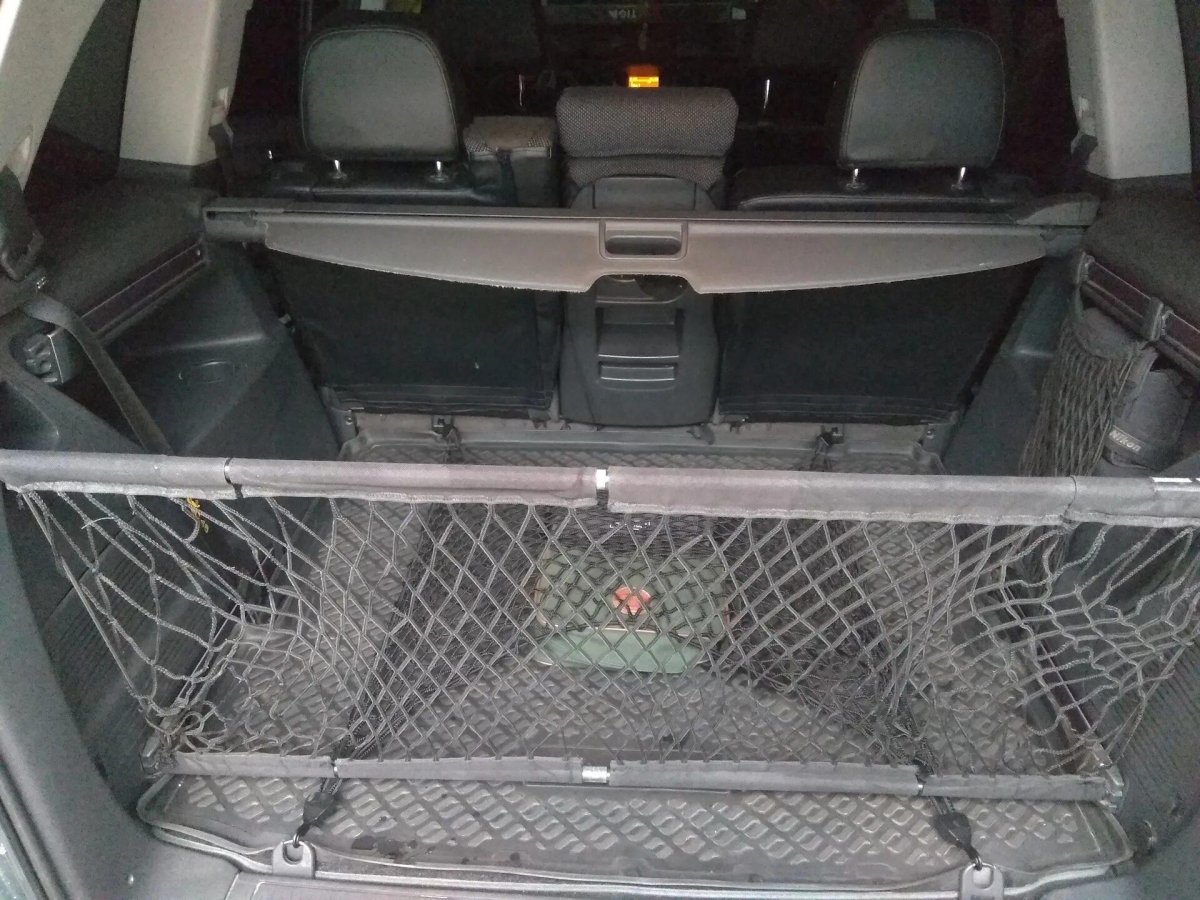 Opel 1707809 сетка багажника