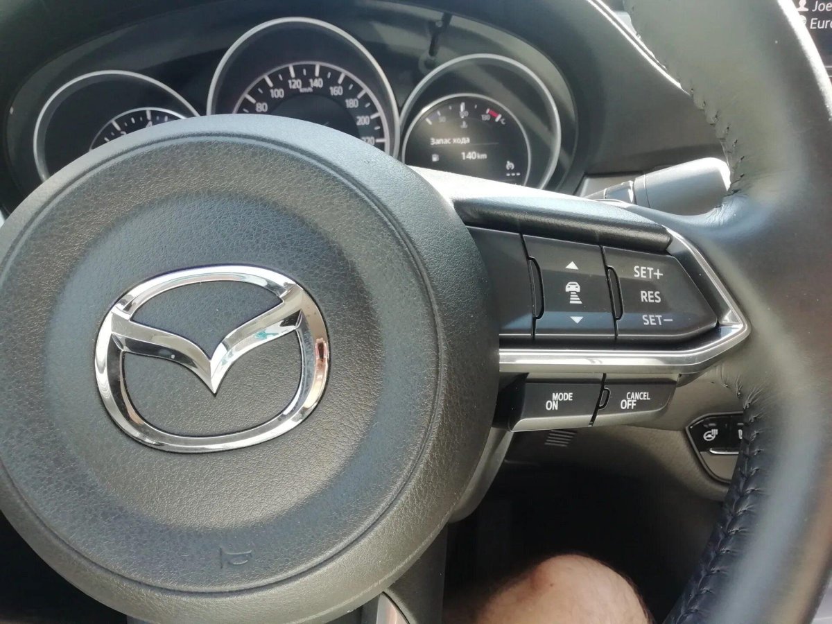 Значок Мазда на руль